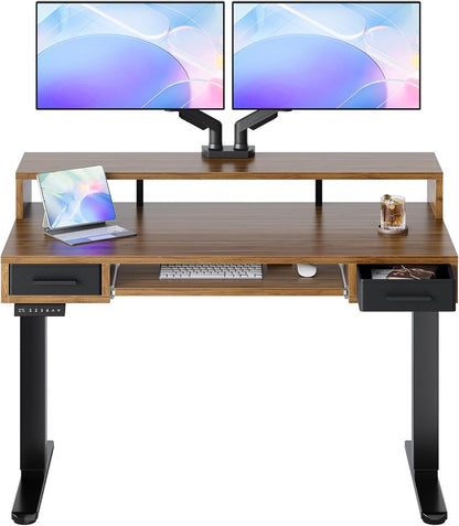 HUANUO 55″ x 26″ Electric Standing Desk with 2 Drawers &24.4″ Large Keyboard Tray, C-Clamp Mount Compatible, Adjustable Computer Desk for Office, Sit Stand Up Desk with 4 Height Presets, Light Walnut