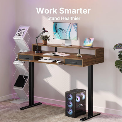 HUANUO 55″ x 26″ Electric Standing Desk with 2 Drawers &24.4″ Large Keyboard Tray, C-Clamp Mount Compatible, Adjustable Computer Desk for Office, Sit Stand Up Desk with 4 Height Presets, Light Walnut