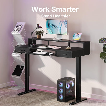 HUANUO 55″ x 26″ Electric Standing Desk with 2 Drawers &24.4″ Large Keyboard Tray, C-Clamp Mount Compatible, Adjustable Computer Desk for Office, Sit Stand Up Desk with 4 Height Presets, Light Walnut