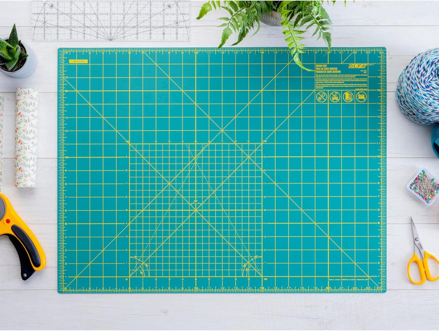 OLFA 18" x 24" Self Healing Rotary Cutting Mat (RM-SG) - Double Sided 18x24 Inch Cutting Mat with Grid for Quilting, Sewing, Fabric, & Crafts, Designed for Use with Rotary Cutters (Green)
