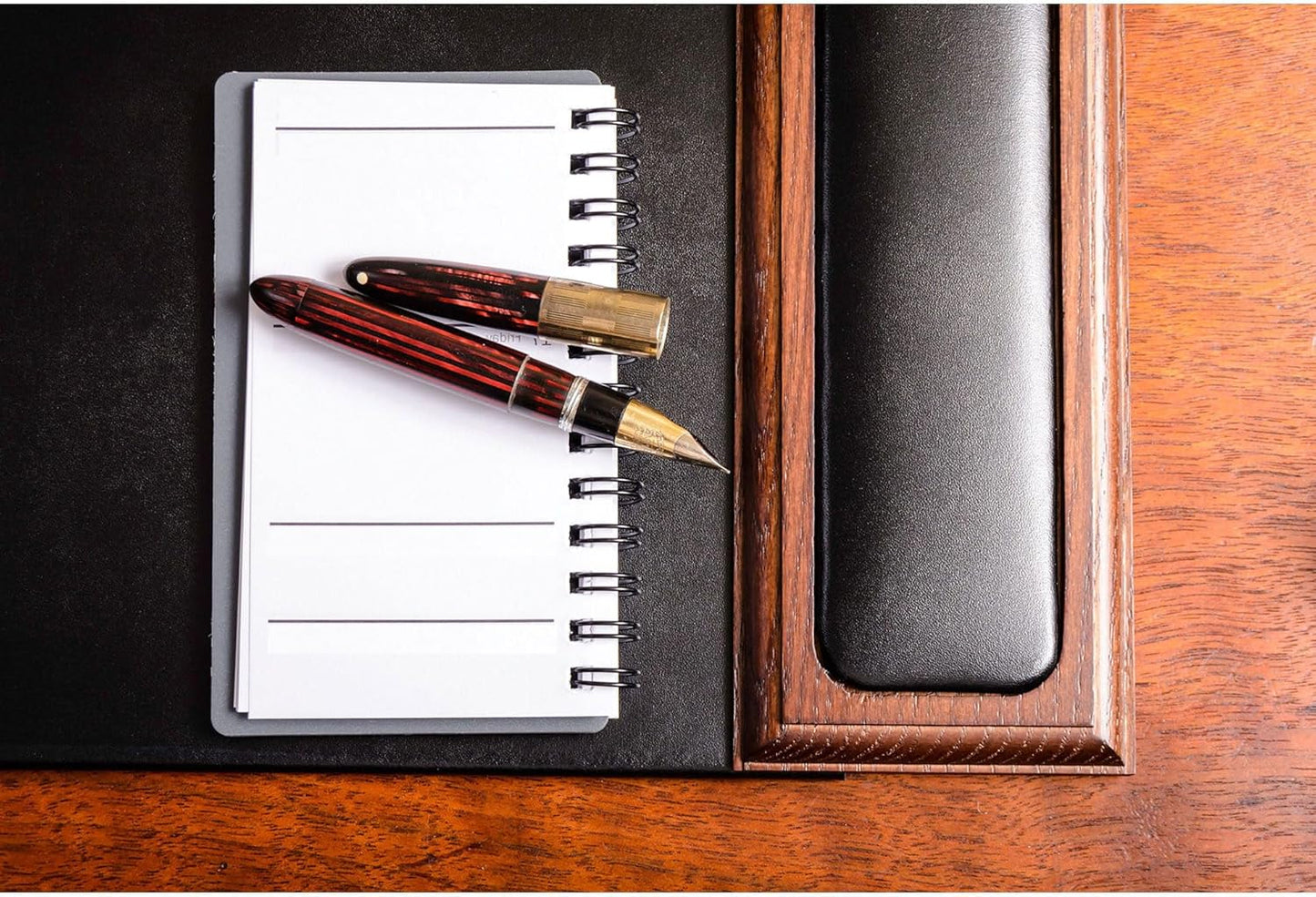 DACASSO Wood & Leather Desk Pad with Side Rails - Luxury Leather Desk Blotter for Writing - Padded Executive Desk Surface Protector - (Walnut & Black, 34” x 20”)